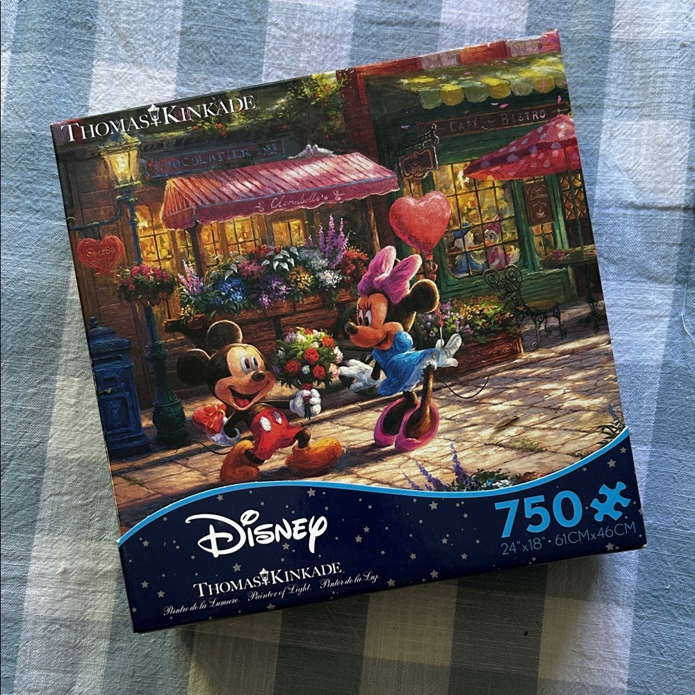 Thomas Kinkade Disney Puzzle with Red and Blue Accents